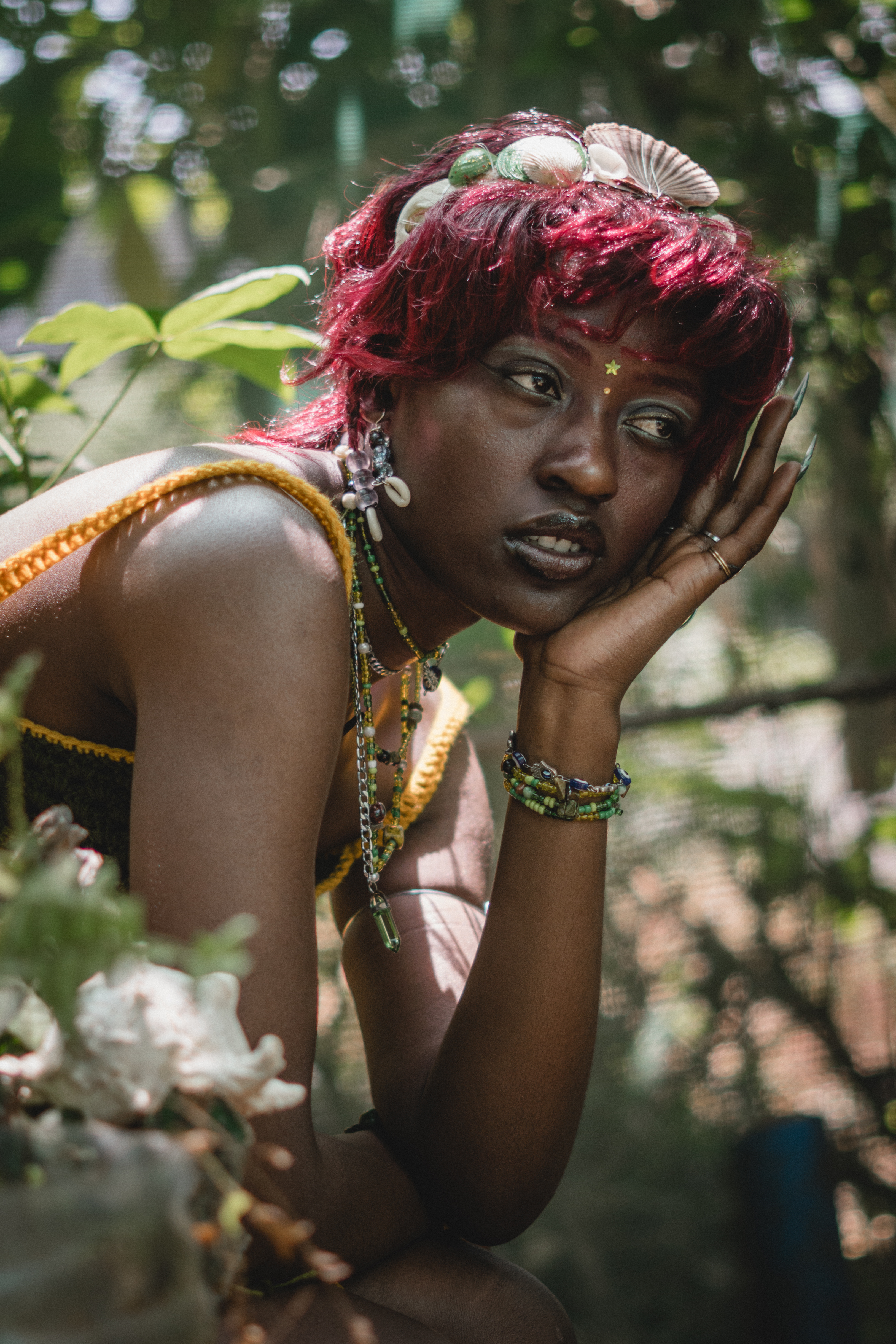 Owirri surrounded by plants in the Cold Blooded era
